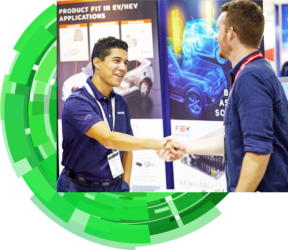 Attendee and exhibitor shaking hands at a tradeshow 
